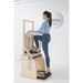 Elina Combination Wunda Chair With A Woman Demonstrating A Step-Up Exercise