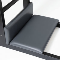 Thumbnail for Elina Elite Ladder Barrel with Steel Base Gray Variant Close-Up View Of The Padded Seat And Backrest On A Pilates Ladder Barrel