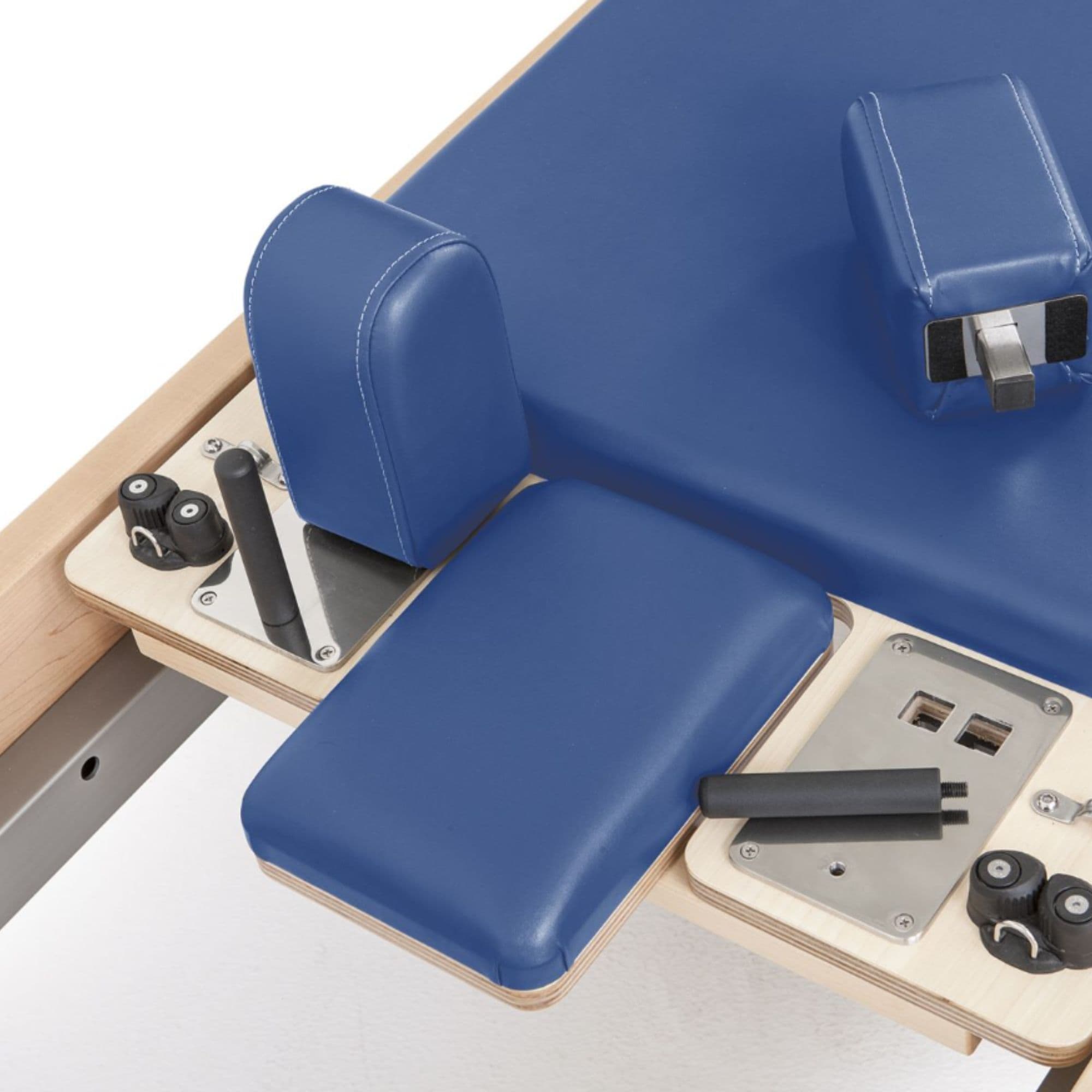 Elina Elite Wood Reformer Blue Variant Close-Up View Of Shoulder Blocks And Sitting Box Attachment Components