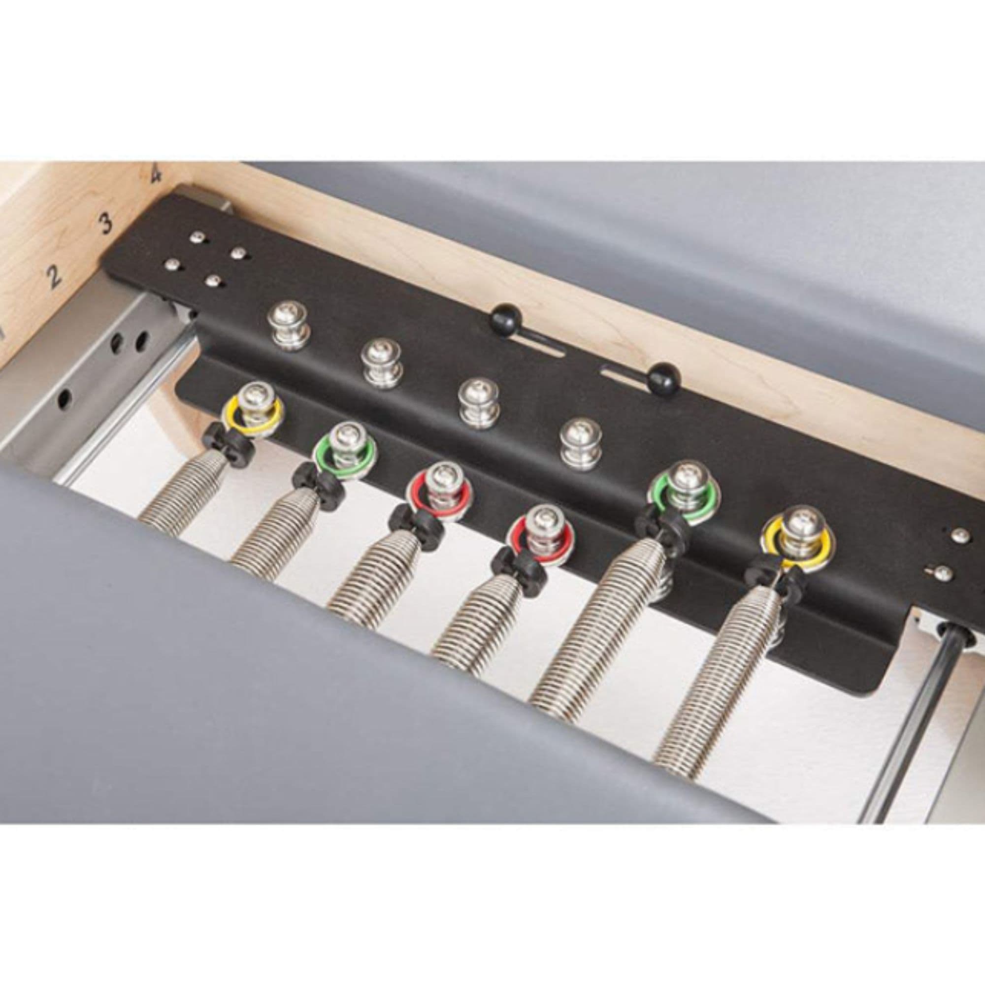 Elina Elite Wood Reformer with Tower Bundle Close-up View Of Color-Coded Spring