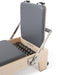Elina Elite Wood Reformer with Tower Close-Up View Of Jump Board With Spring Resistance Controls On White Background