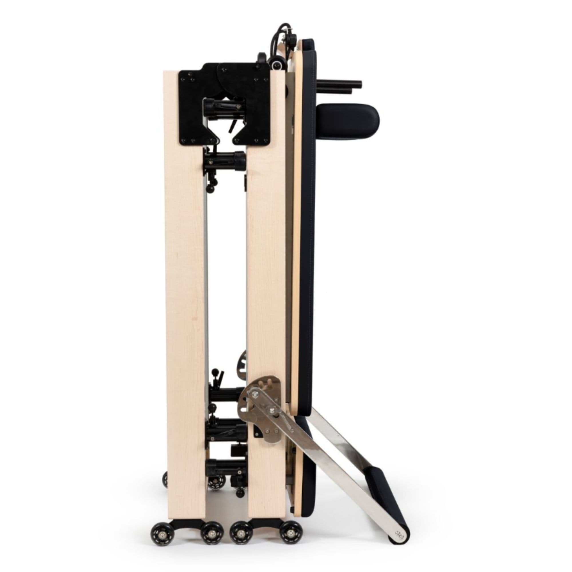 Elina Foldable Reformer for Home Black Variant Side View Showing Space-Saving Folded Configuration On White Background