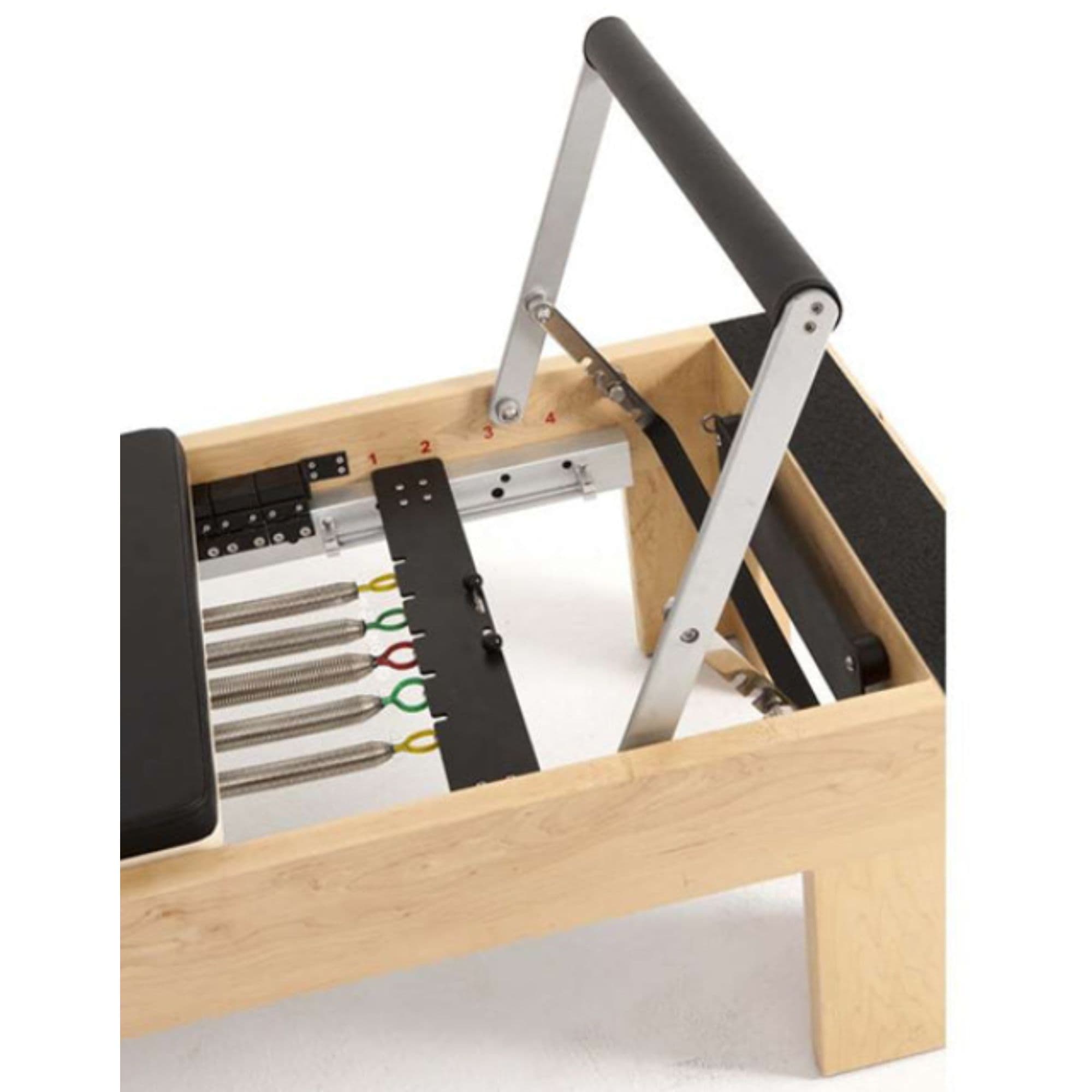 Elina Physio Wood Reformer with Tower Bundle Close-Up View Of Color Coded Resistance Springs And Foot Bar
