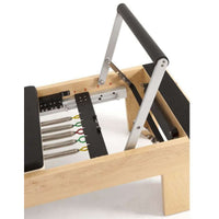 Thumbnail for Elina Physio Wood Reformer with Tower Bundle Close-Up View Of Color Coded Resistance Springs And Foot Bar