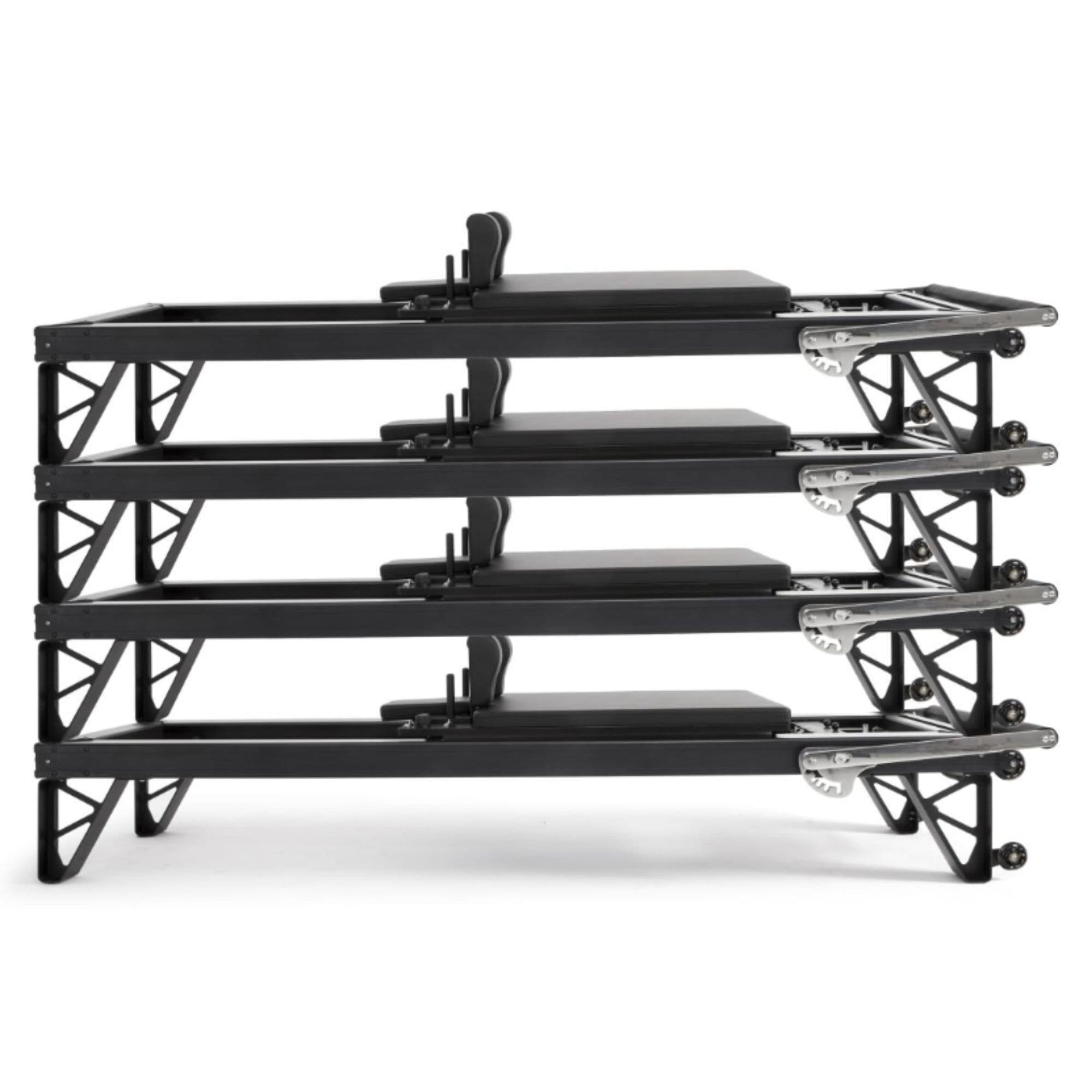 Elina Pilates Adjustable Height Aluminum Reformer with Tower Side View In Stacked Storage Position On White Background