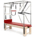 Elina Pilates Cadillac Trapeze Table Red Variant Front Angled View Showing Full Tower Attachment On White Background
