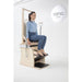 Elina Pilates Combination Wunda  Electric Chair With A Woman Preparing For A Pilates Arm Chair Exercise