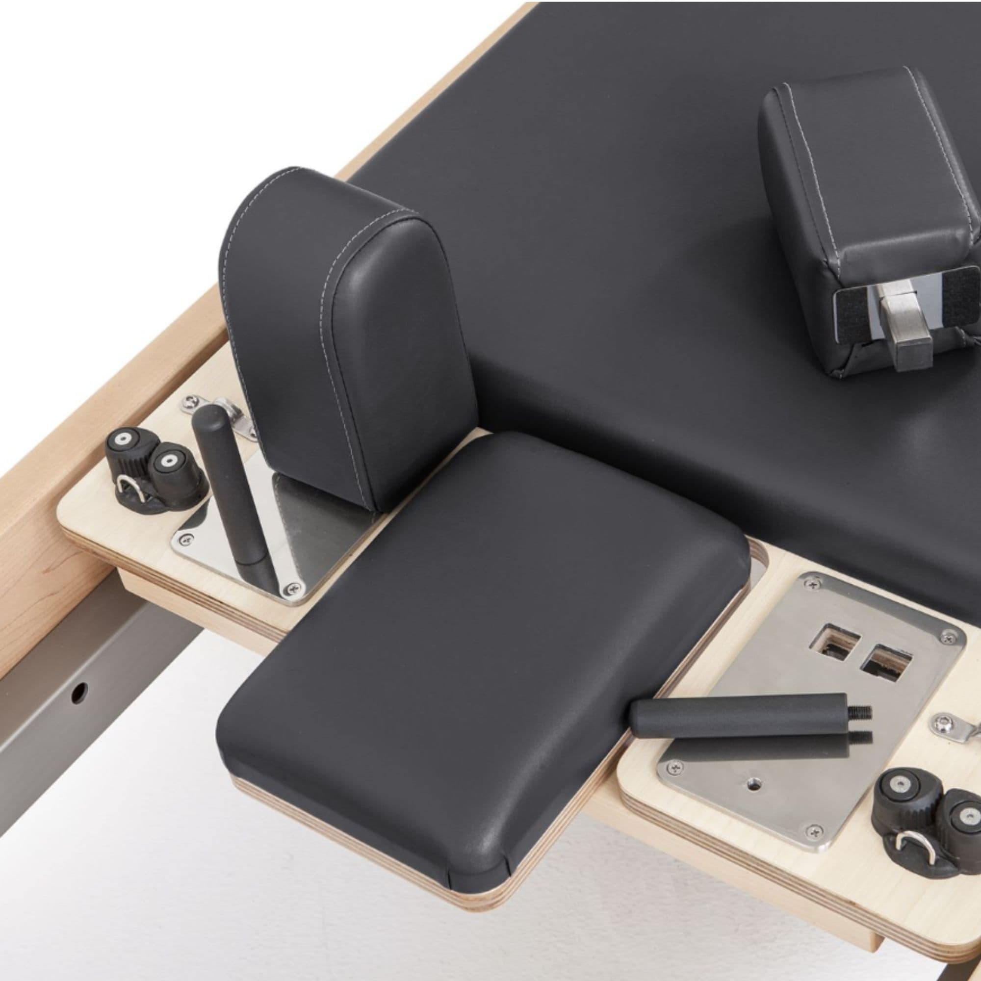 Elina Pilates Elite Wood Reformer Black Variant Close-Up View Of Shoulder Blocks And Sitting Box Attachment Components