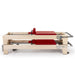 Elina Pilates Elite Wood Reformer Bundle Red Variant Side View In Two Stacked Storage Position On White Background