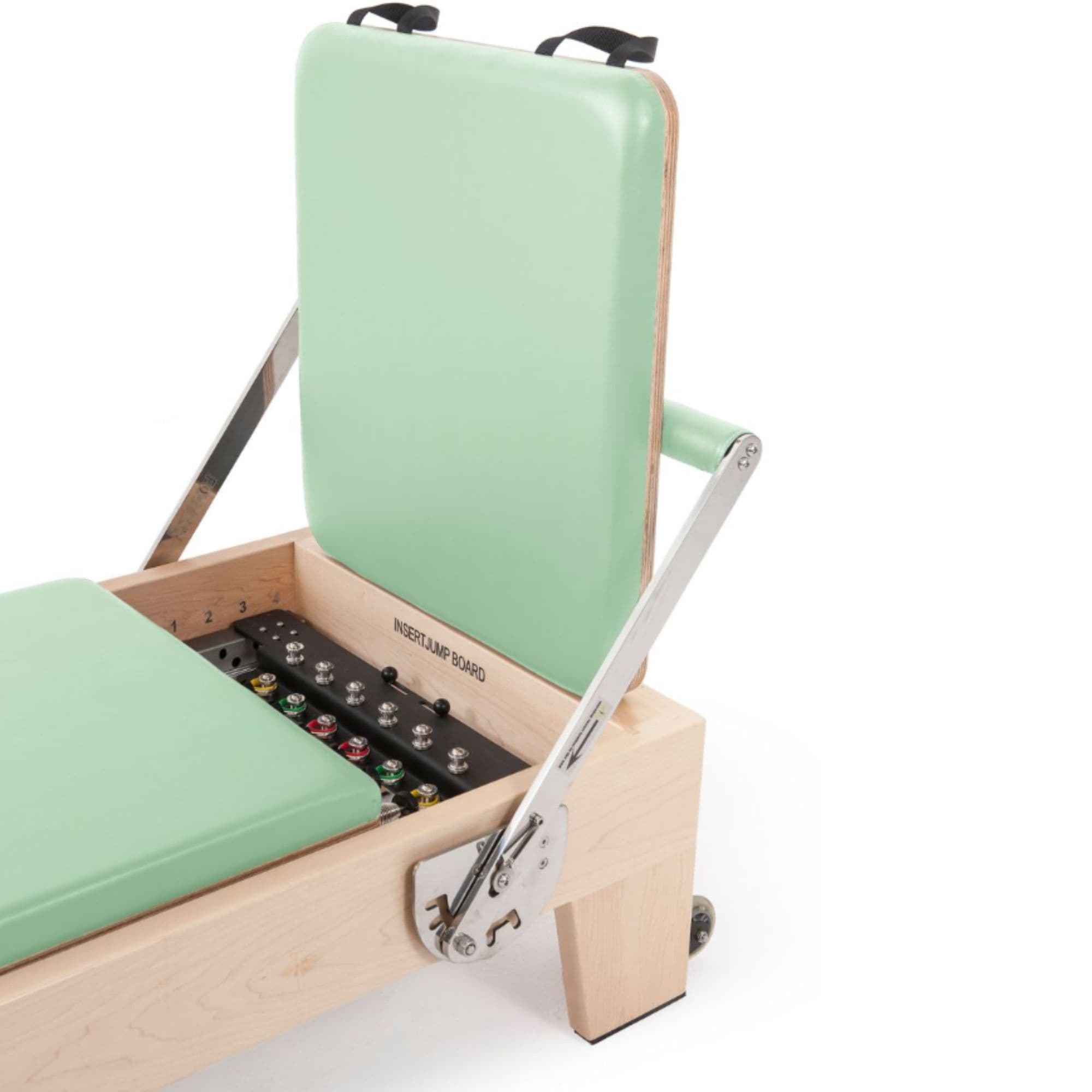 Elina Pilates Elite Wood Reformer Green Variant Close-Up View Of Jumpboard With Spring Resistance Controls On White Background