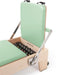 Elina Pilates Elite Wood Reformer Green Variant Close-Up View Of Jumpboard With Spring Resistance Controls On White Background