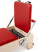 Elina Pilates Elite Wood Reformer Red Variant Close-Up View Of Jumpboard With Spring Resistance Controls On White Background