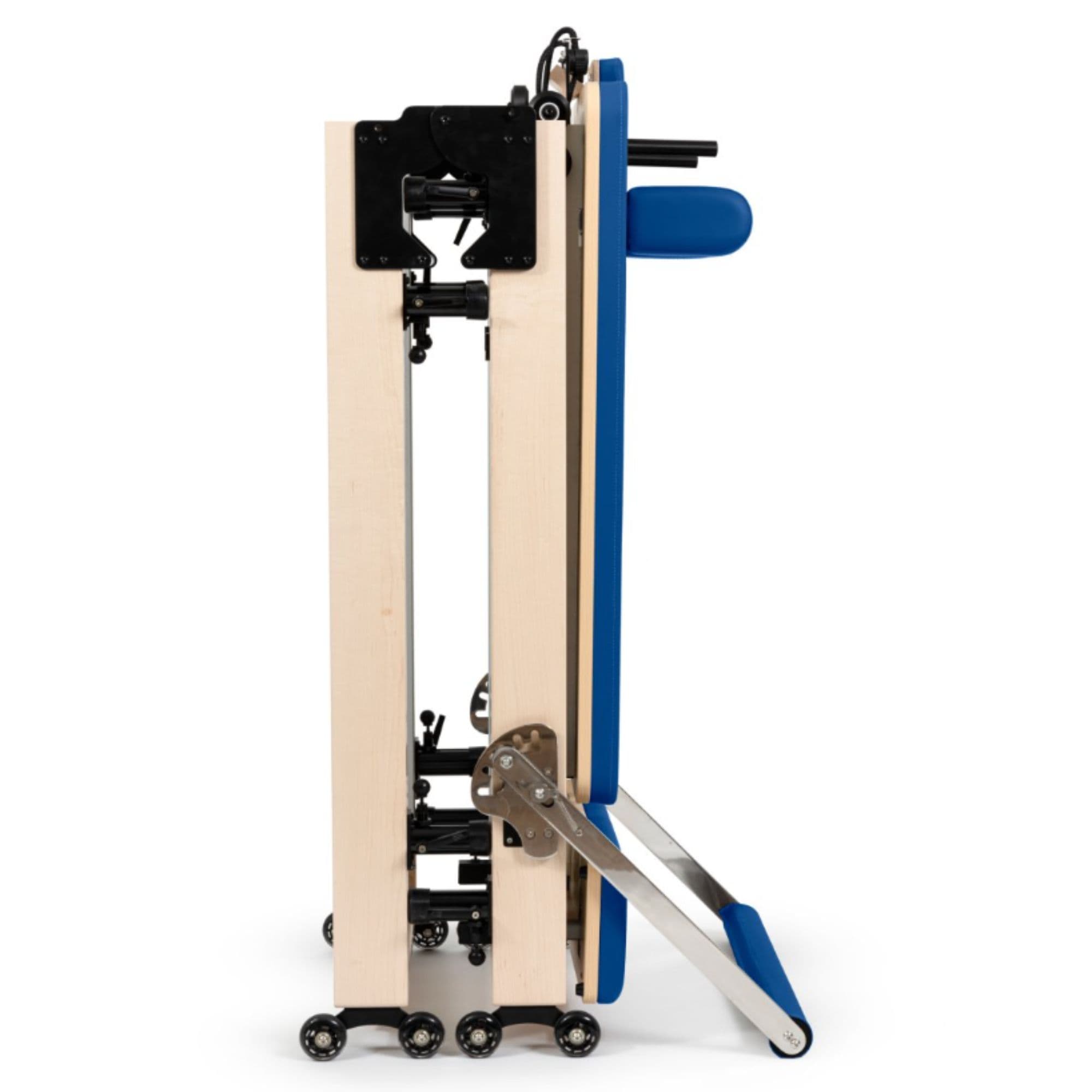 Elina Pilates Home Foldable Reformer Blue Variant Side View Showing Space-Saving Folded Configuration On White Background