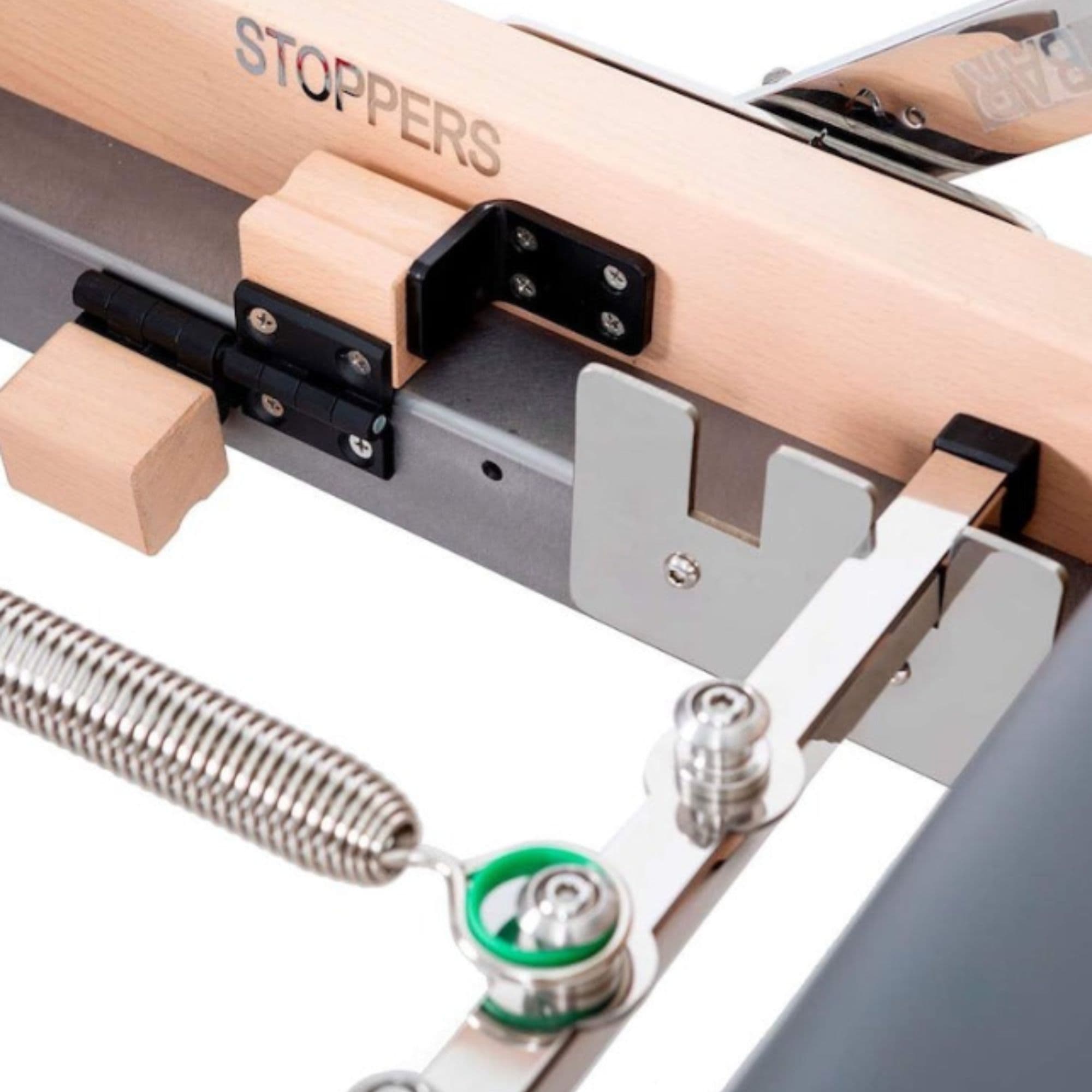 Elina Pilates Lignum Wood Reformer & Tower Set Close-Up View Of Color-Coded Spring And Internal Hardware