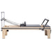 Elina Pilates Master Instructor Physio Reformer Side View On White Background