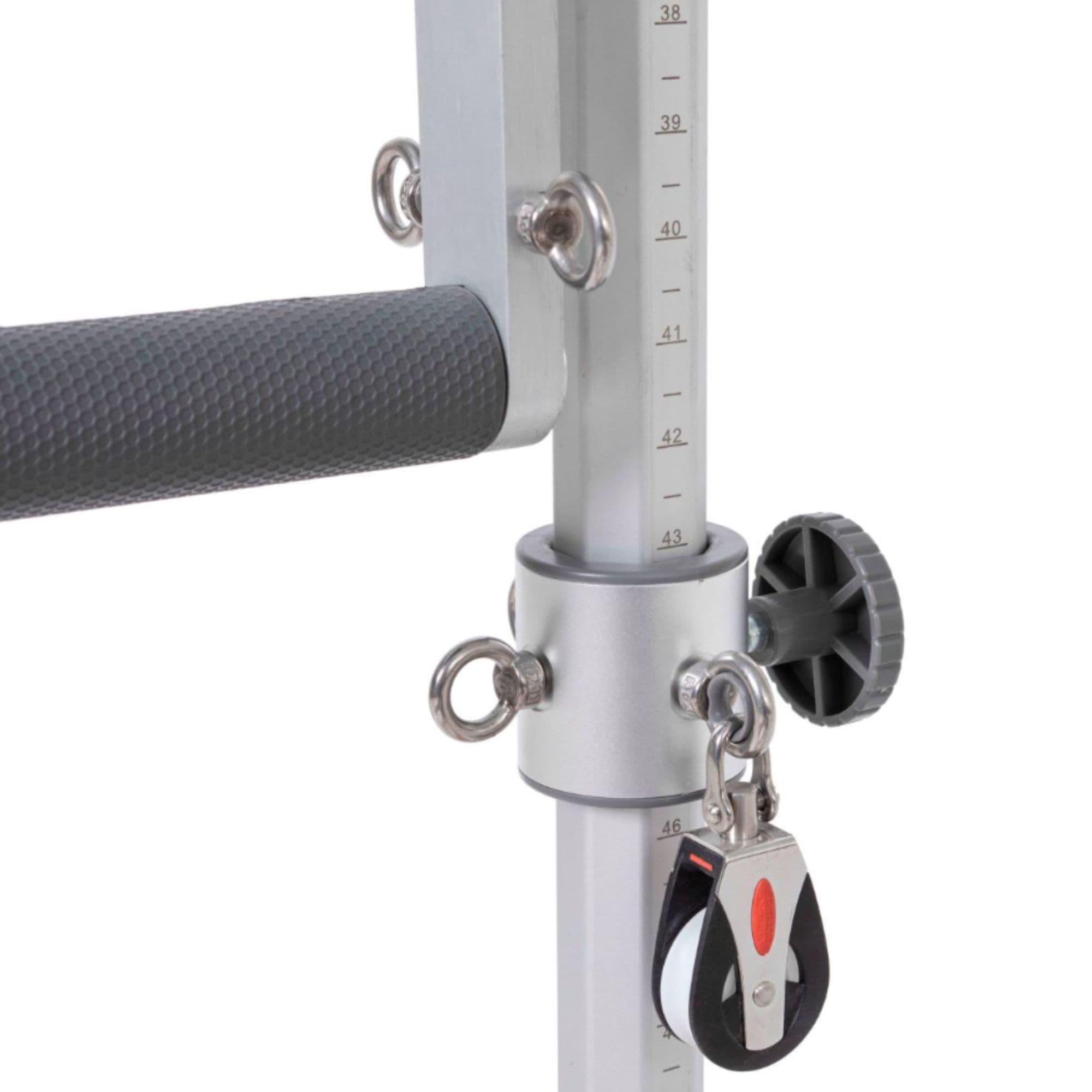 Elina Pilates Physio Reformer Master Instructor with Tower Close-Up Showing Precision Height Adjustment And Pulley Attachment