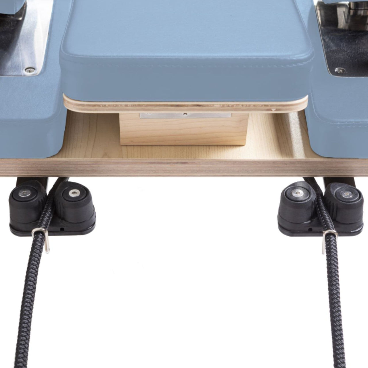 Elina Pilates Physio Reformer Master Instructor with Tower Close-Up View Of Reformer Rope Guide Pulleys On White Background