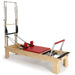 Elina Pilates Physio Wood Reformer with Tower Red Variant Front Angled View With Complete Set On White Background
