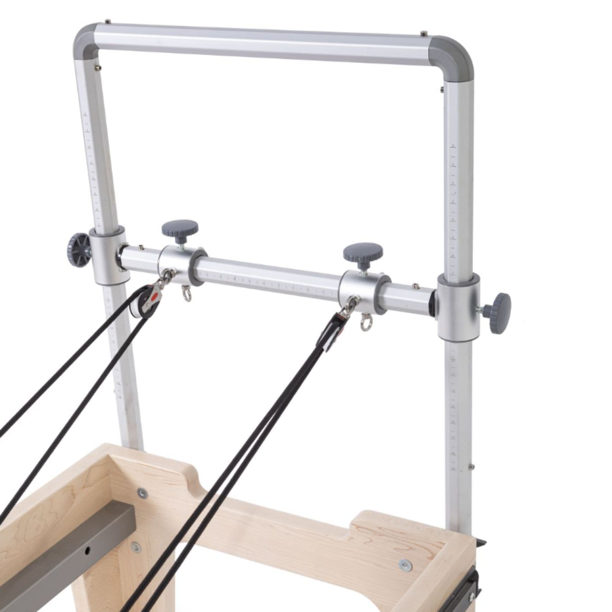 Elina Pilates Reformer Master Instructor Close-Up View Of Adjustable Pulley Tower And Crossbar System