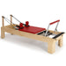 Elina Pilates Rehab Wood Reformer Red Variant Front Angled View With Complete Set On White Background