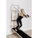 Elina Pilates Wall Board ONNE With A Woman Performing Squat Exercise