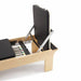 Elina Pilates Wood Reformer Close-Up View Of Jump Board And Color Coded Resistance Springs