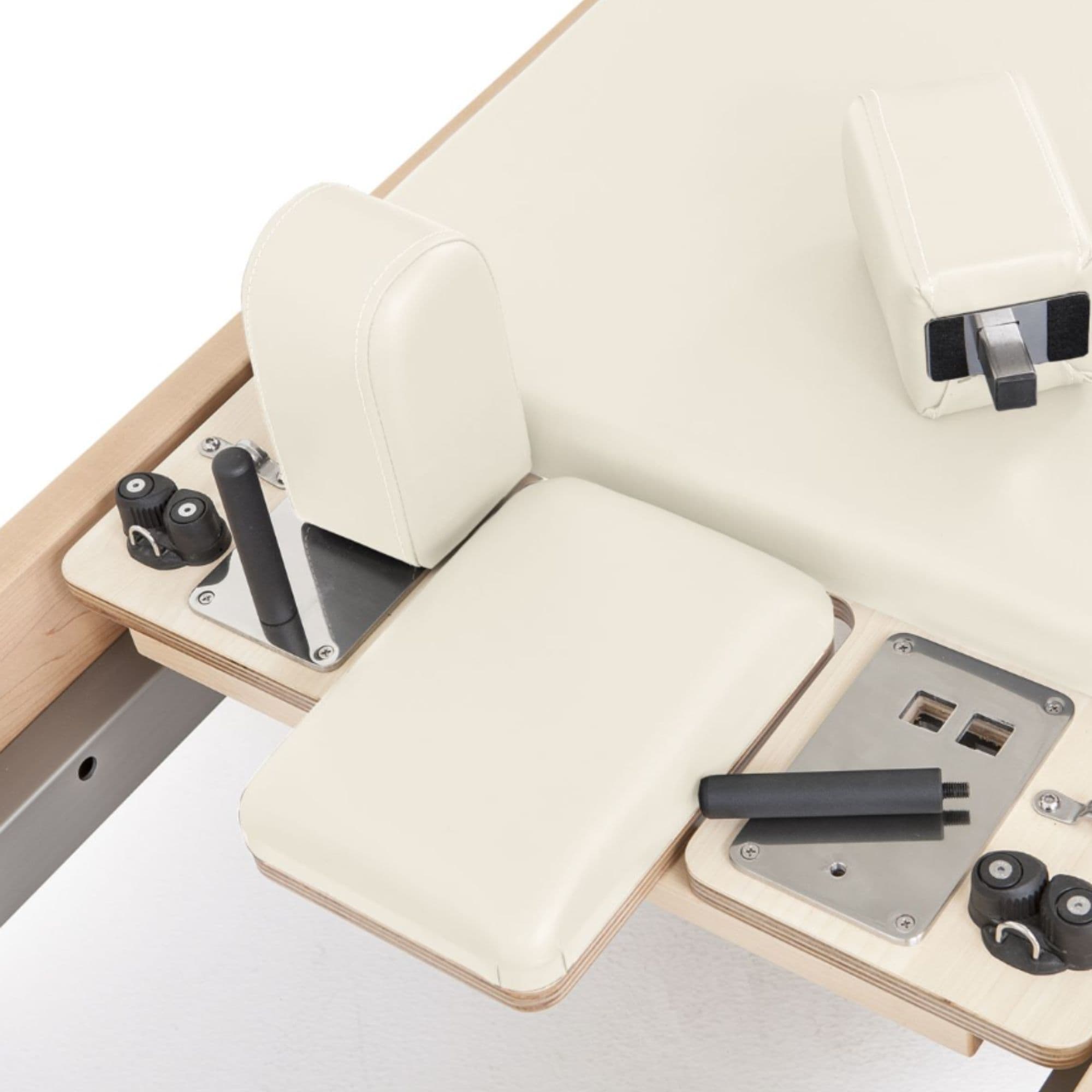 Elina Pilates Wood Reformer Elite Ivory Variant Close-Up View Of Shoulder Blocks And Sitting Box Attachment Components