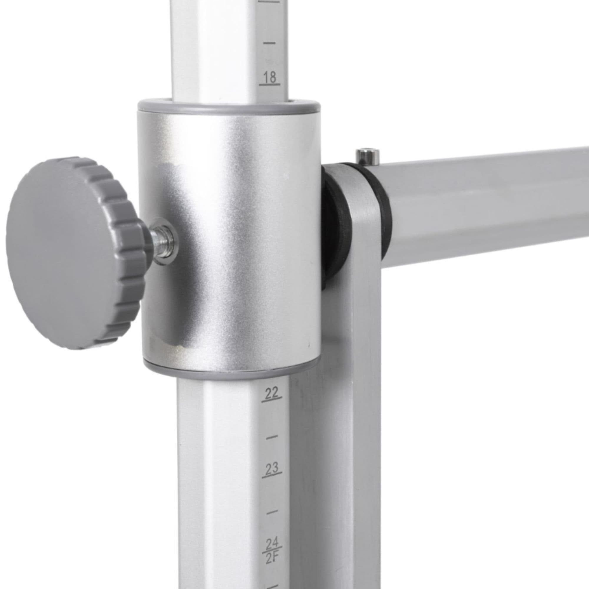 Elina Reformer Master Instructor with Tower Close-Up View Of Adjustable Tower Upright Locking Knob On White Background