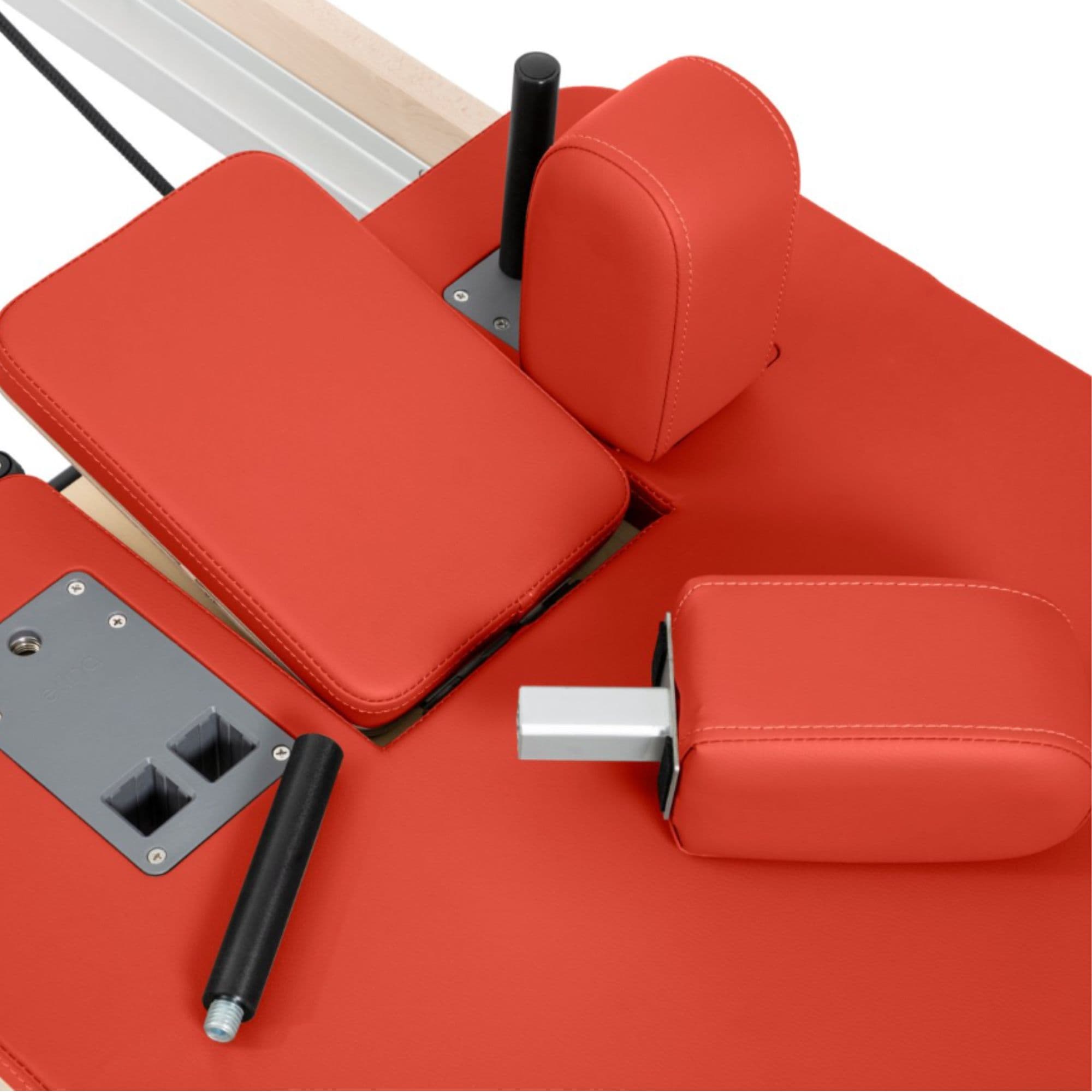 Elina Vertical Pilates Reformer Close-Up View Of Red Upholstery And Shoulder Rest Assembly