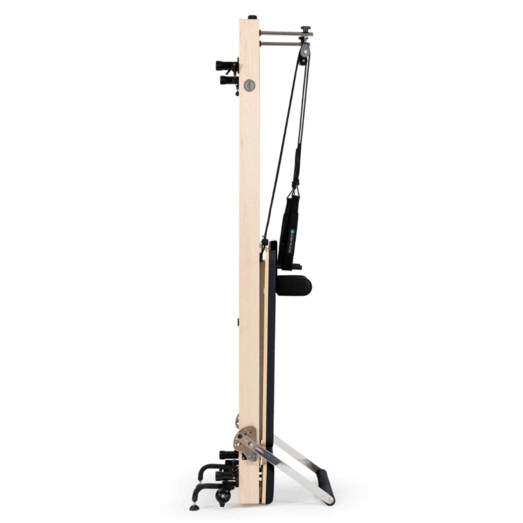 Elina Vertical Reformer for Home Black Variant Side View Showing Space-Saving Folded Configuration On White Background