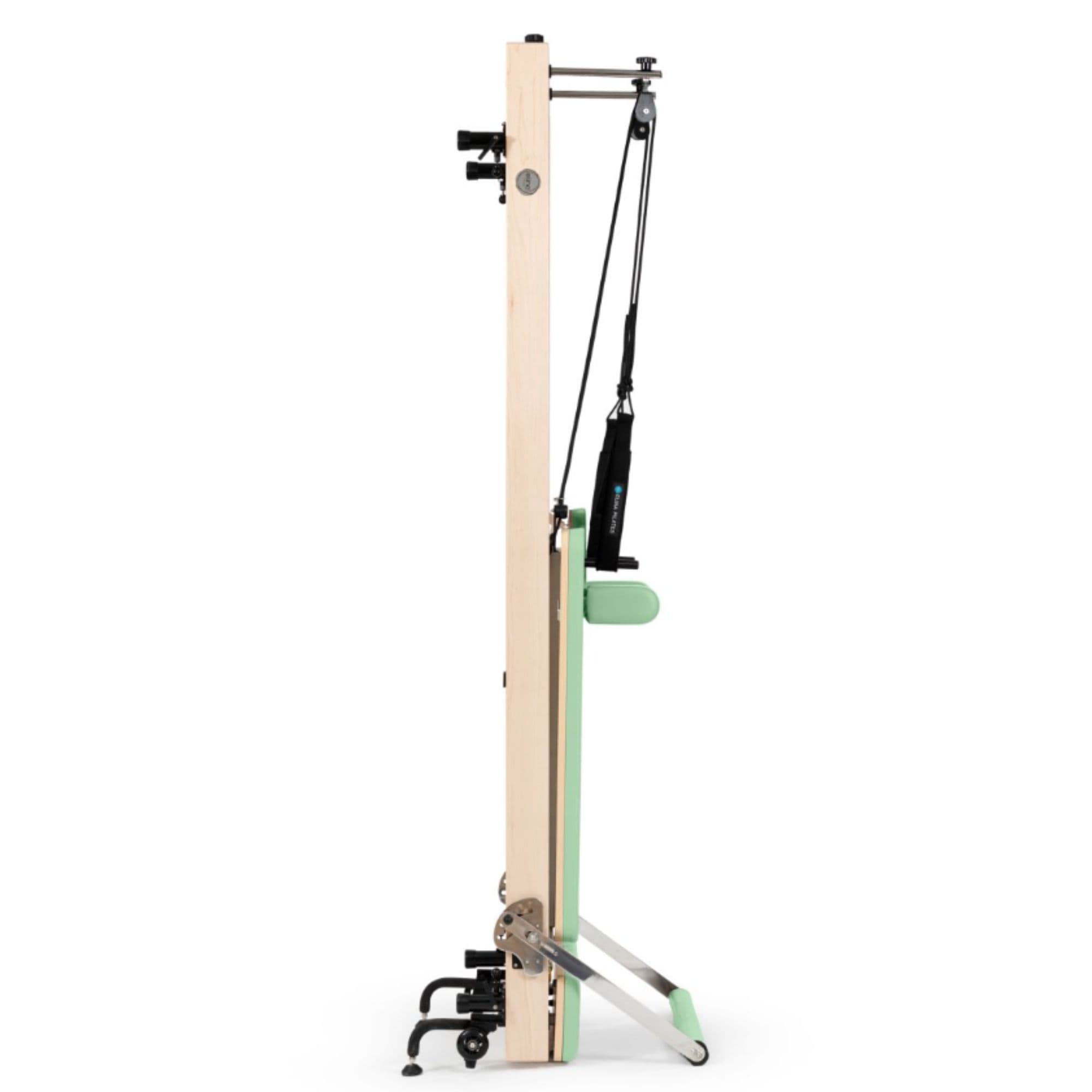 Elina Vertical Reformer for Home Green Variant Side View Showing Space-Saving Folded Configuration On White Background