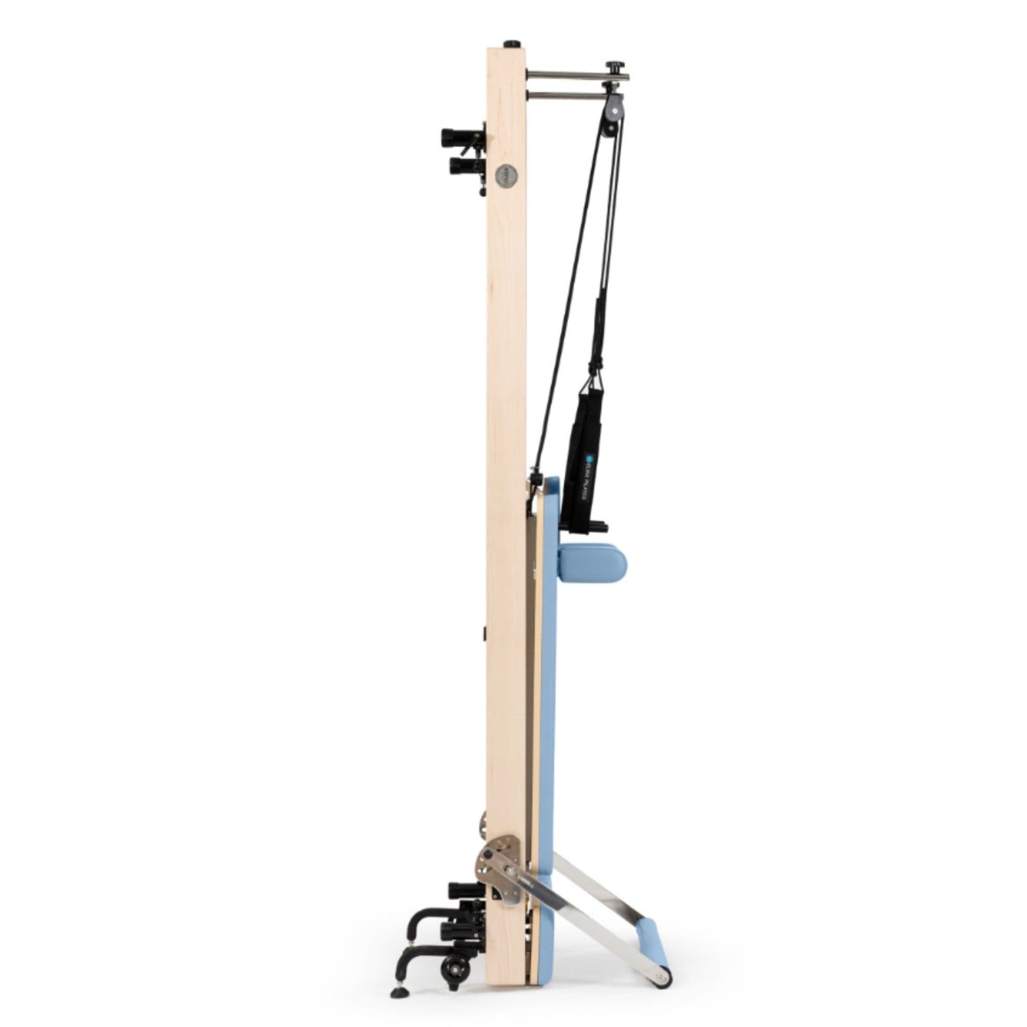 Elina Vertical Reformer for Home Ocean Blue Variant Side View Showing Space-Saving Folded Configuration On White Background