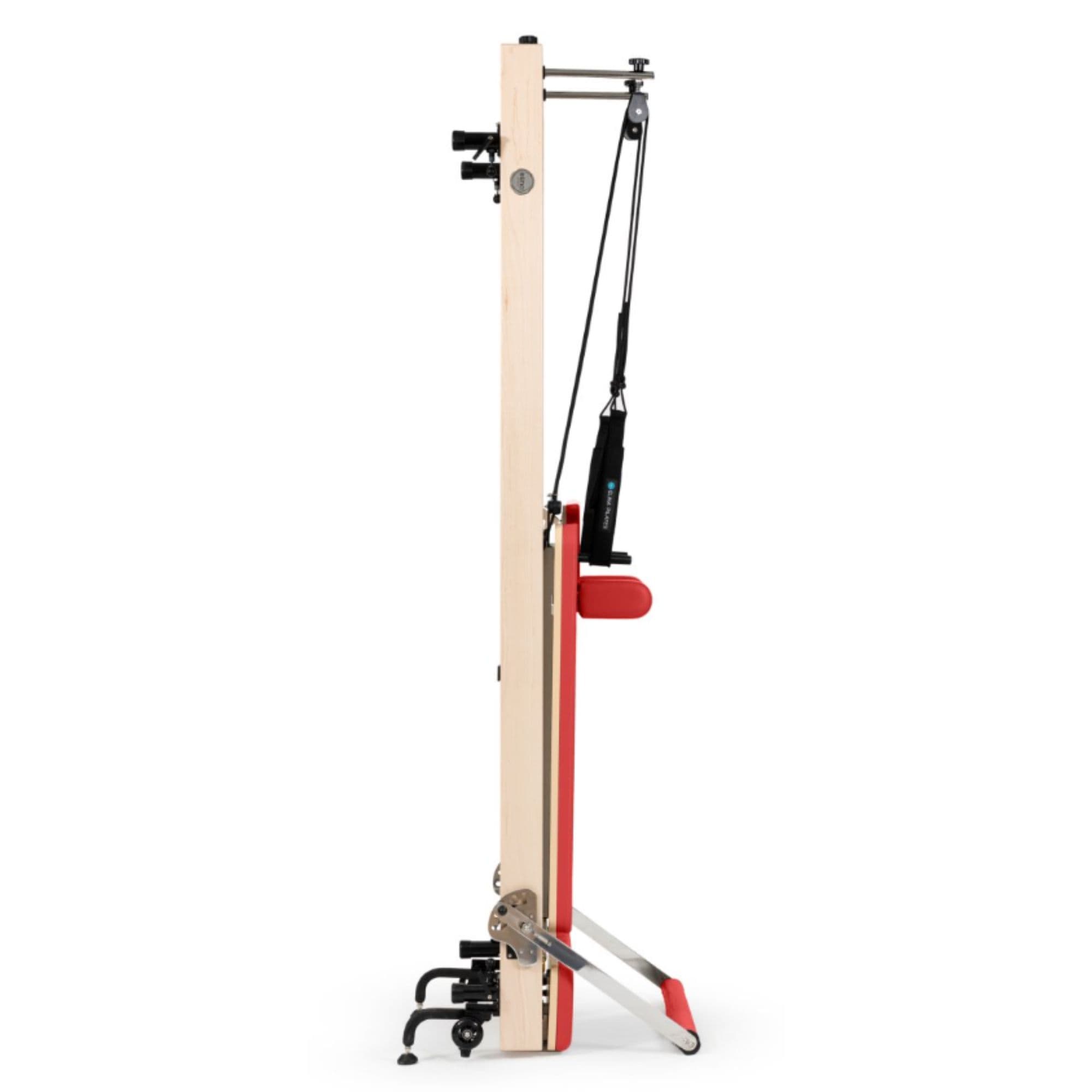 Elina Vertical Reformer for Home Red Variant Side View Showing Space-Saving Folded Configuration On White Background