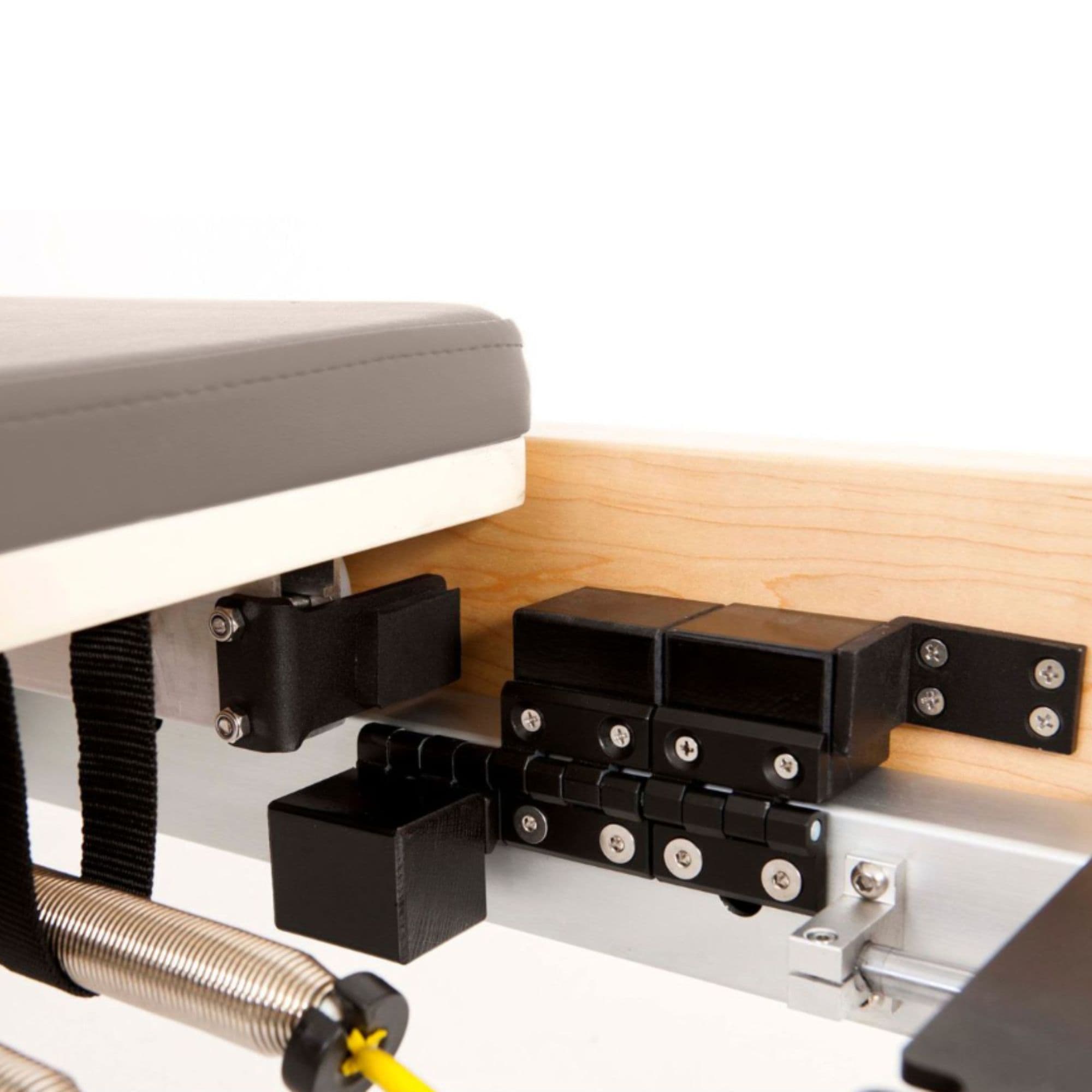 Elina Wood Pilates Reformer Close-Up View Of Folding Lock And Internal Hardware