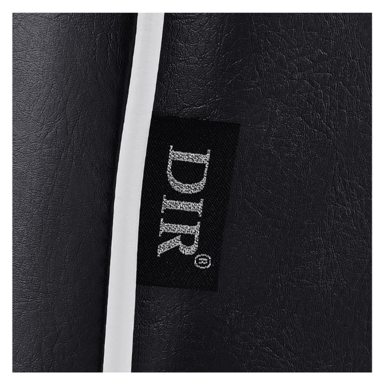 Executive All Purpose Reclining Chair Close-Up View Of Black Upholstery With Brand Name