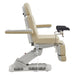 Geneva 4-Motors Exam Table with Stirrups - OB GYN Beige Side View Showing Swing-Away Armrest Position On White Background