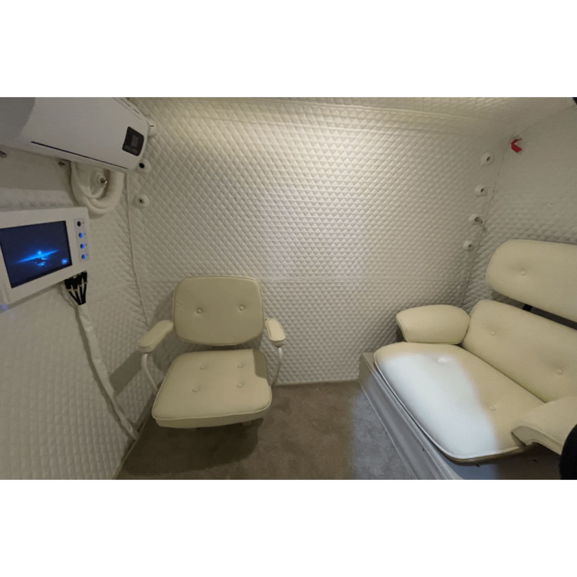 HE5000 Mini Single Person Hyperbaric Chamber Interior View With White Chairs And Accessories