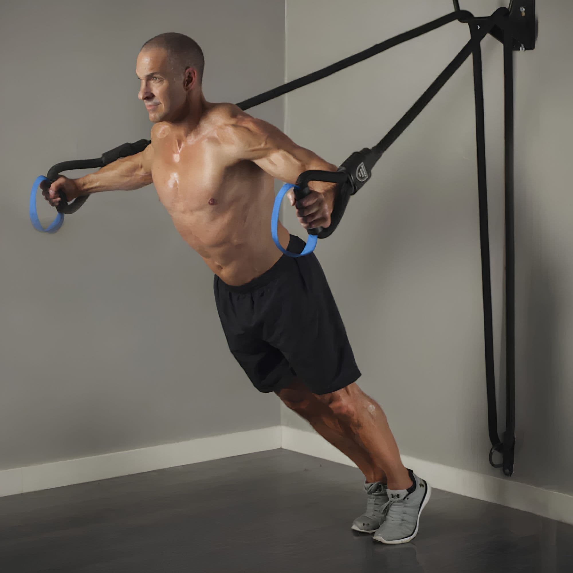 HIIT Zone Elite Functional Training Package With A Man Performing A Chest Fly Exercise
