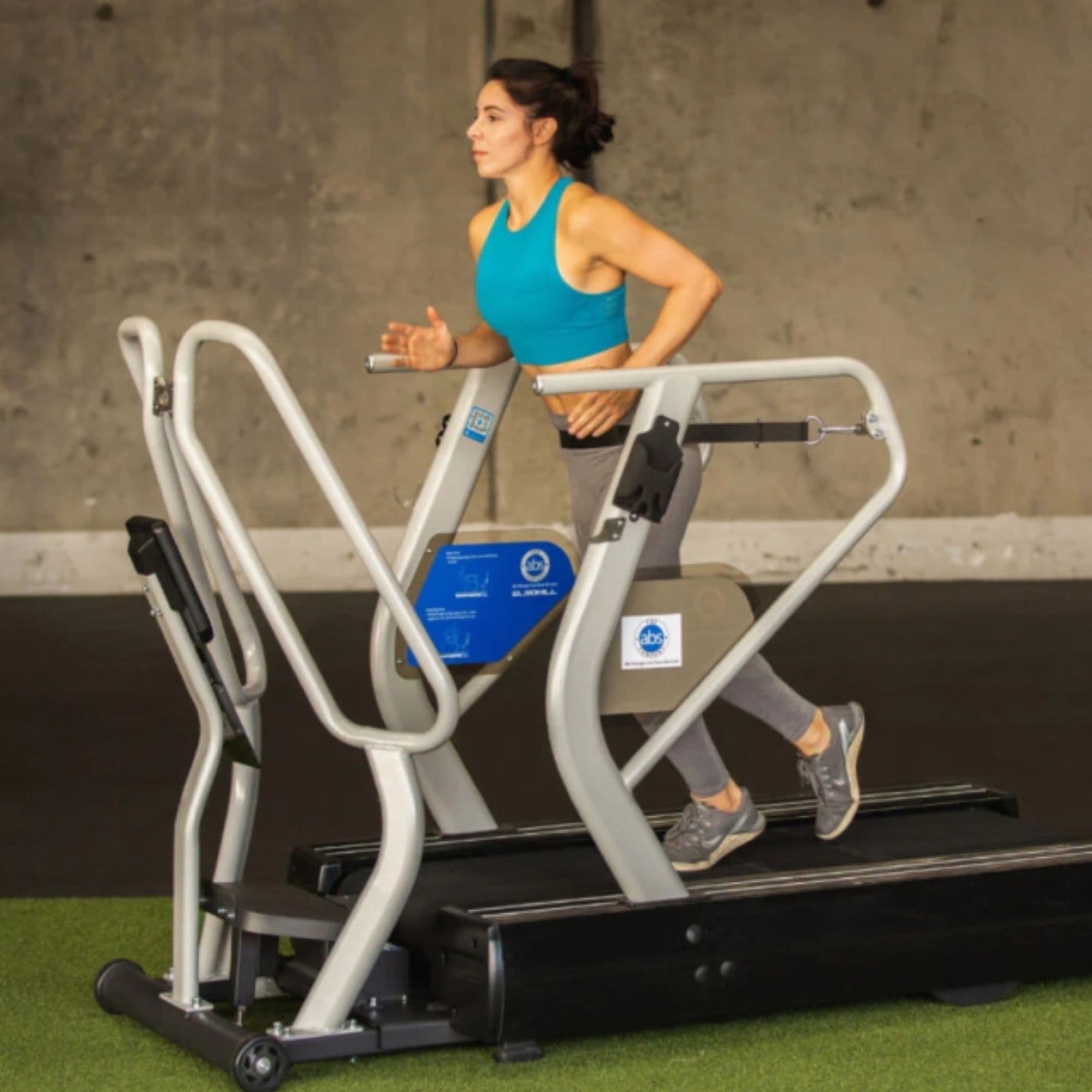 HIIT Zone Elite XL By The Abs Company With A Woman Running On Gym Setting