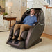 Infinity Evolution Massage Chair Front Angled View Of A Man Enjoying The Massage In A Modern Living Room
