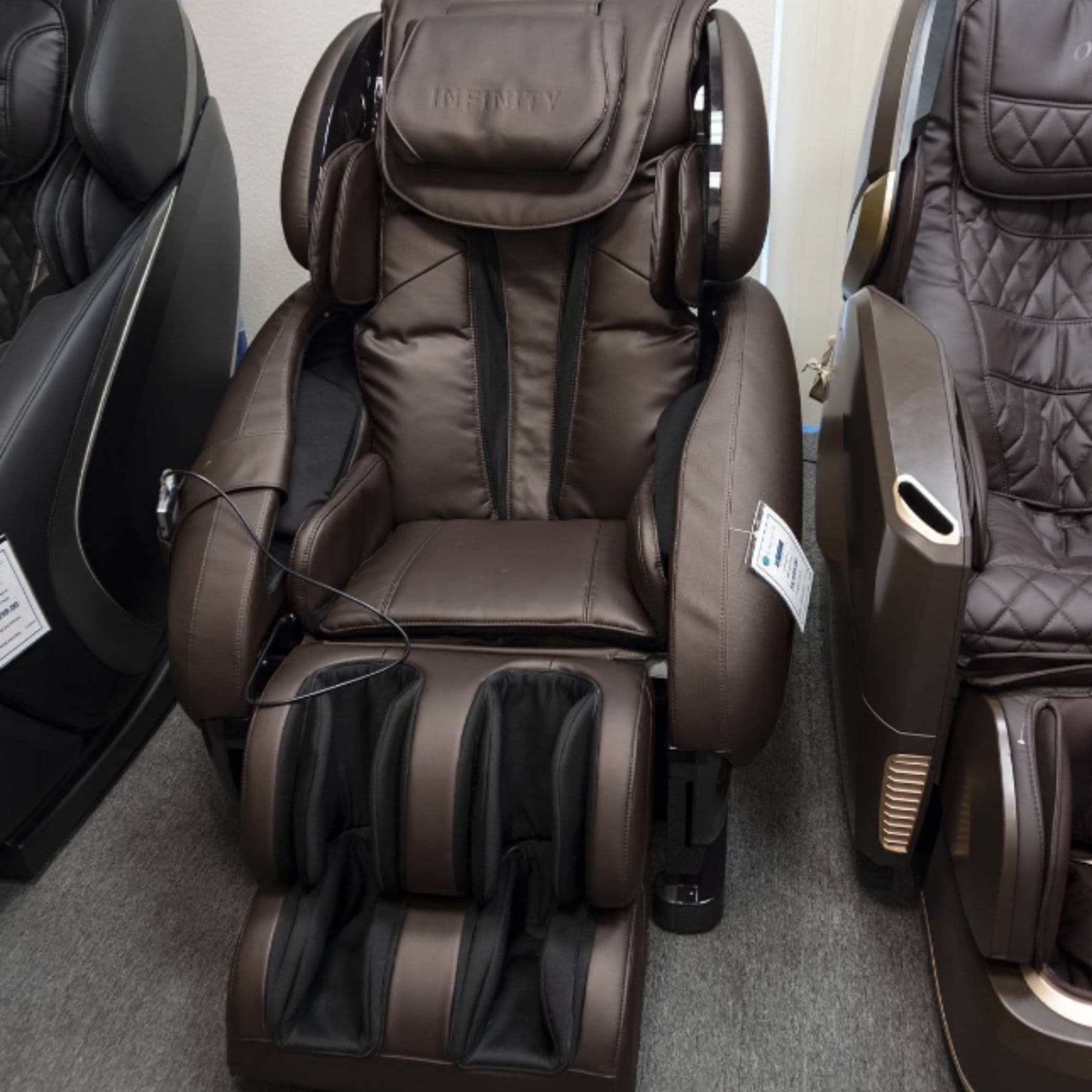 Infinity IT-8500 Plus Massage Chair Certified Pre-Owned Front View Besides The Other Variants