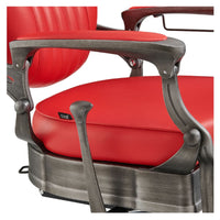 Thumbnail for Kaiser Retro Classic Barber Chair Close-Up View Of Decorative Armrest Support And Red Upholstered Seat