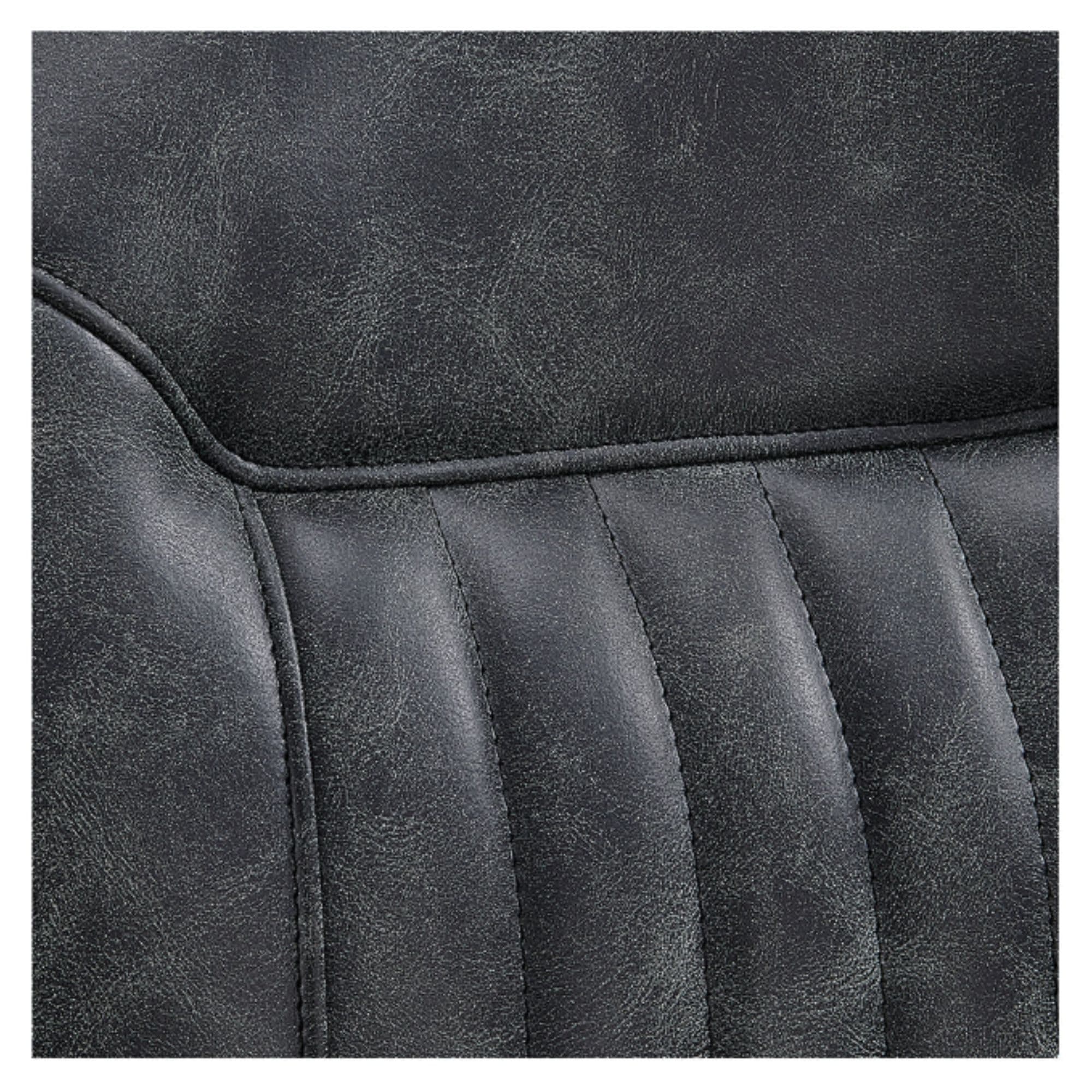 Kaiser Retro Style Vintage Barber Chair Close-Up View Of Back Rest Striped Vintage Black Upholstery Pattern