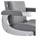 Kingston Hydraulic Barber Chair Close-Up View Of Decorative Metallic Gold Armrest Support And Gray Upholstered Seat