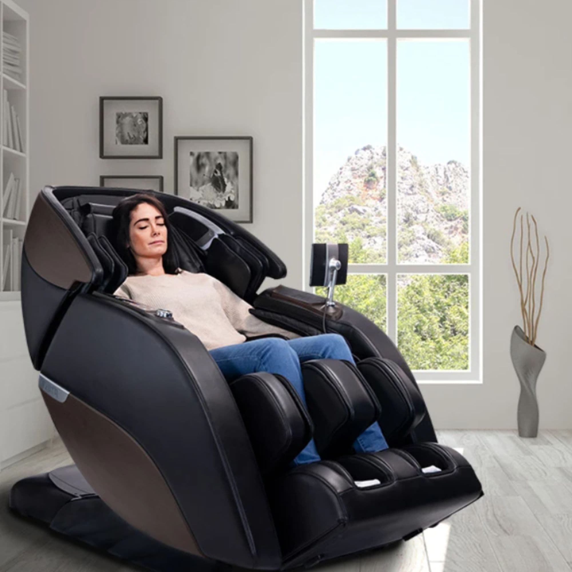 Kyota Nokori M980 Massage Chair Front Angled View Of A Woman Relaxing With Mountain Views