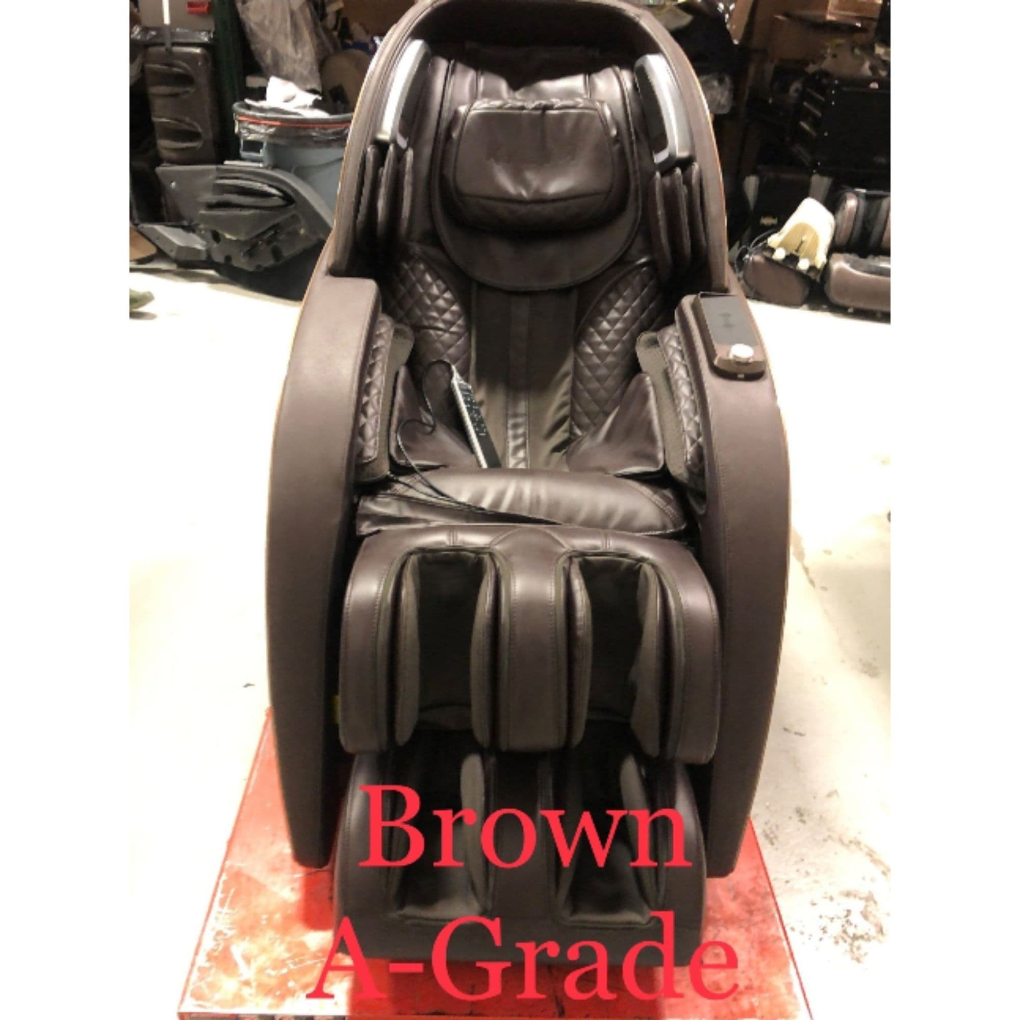 Kyota Yutaka M898 4D Massage Chair Certified Pre-Owned Brown A-Grade Front View In A Stockroom Setting