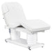 Luxi 4-Motors Medical Spa Treatment Bed Front Angled View Of White Color With Semi-Folded Leg Section And Remote Control On White Background