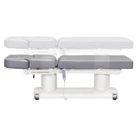 Thumbnail for Luxi 4-Motors Medical Spa Treatment Bed Side View And Fully Reclined Of Gray Color Showing An Up And Down Adjustment With Remote Control On White Background