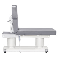 Thumbnail for Luxi 4-Motors Medical Spa Treatment Bed Side View Of Gray Color And Fully Reclined On Head Section With Remote Control On White Background
