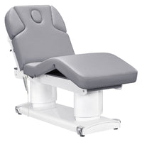 Thumbnail for Luxi Quad-Motor Medical Spa Bed Front Angled View Of Gray Color With Semi-Folded Leg Section And Remote Control On White Background